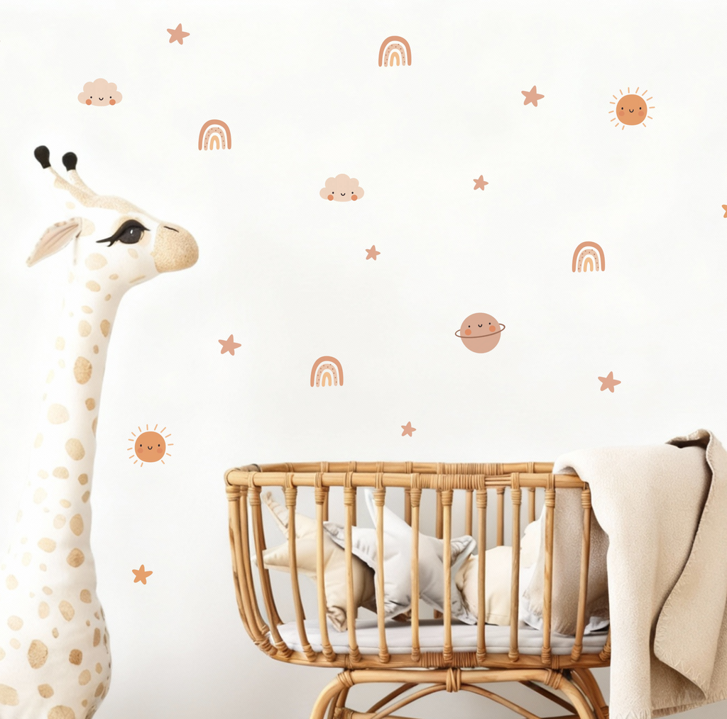cosmic cuties kids wall decals with planets, suns, clouds and rainbows in a cozy nursery corner