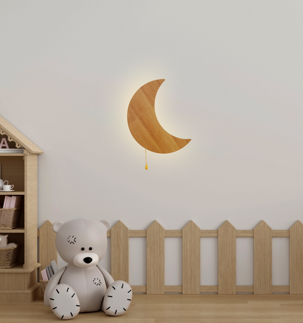 Wooden crescent moon wall lamp glowing softly in a cozy children’s nursery