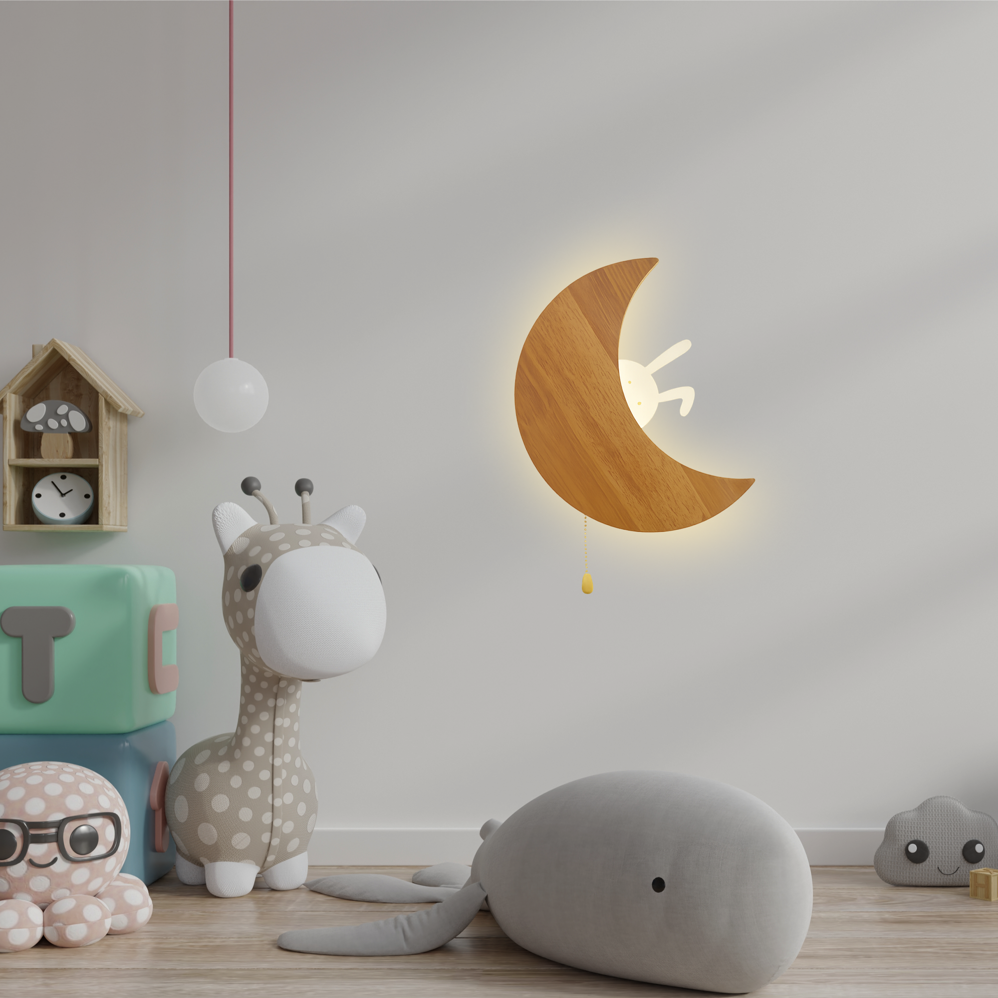 Wooden crescent moon wall lamp with a cute bunny detail glowing in a styled children’s nursery